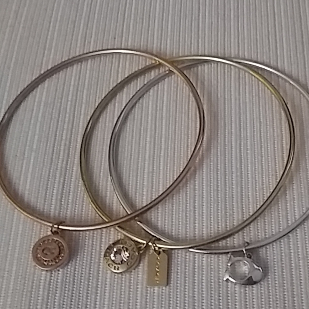 Coach charm bracket trio